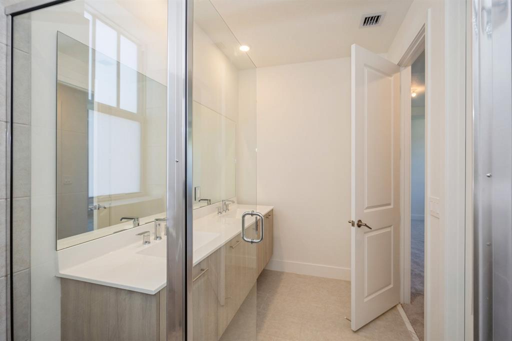 4385 Southwest 123rd Avenue Davie, FL 33330 - Photo 36 of 46 a bathroom with a sink a mirror and a shower