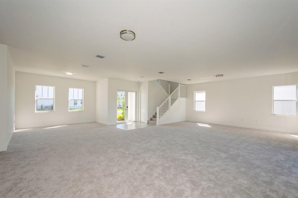 4385 Southwest 123rd Avenue Davie, FL 33330 - Photo 5 of 46 an empty room with windows and fireplace