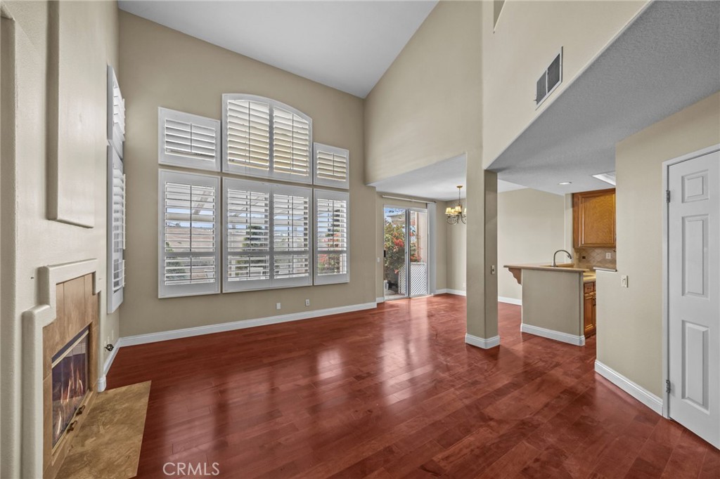 28677 La Azteca Laguna Niguel, CA 92677 - Photo 11 of 36 a view of an empty room with a window and wooden floor