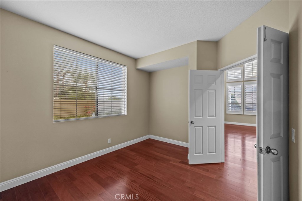 28677 La Azteca Laguna Niguel, CA 92677 - Photo 20 of 36 an empty room with wooden floor and windows
