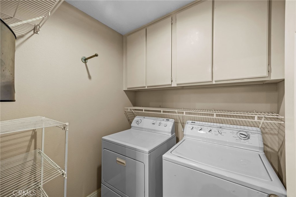 28677 La Azteca Laguna Niguel, CA 92677 - Photo 23 of 36 a utility room with dryer and washer