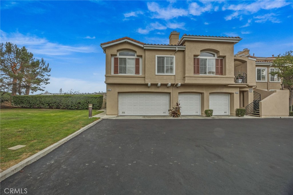 28677 La Azteca Laguna Niguel, CA 92677 - Photo 34 of 36 a front view of a house with garden