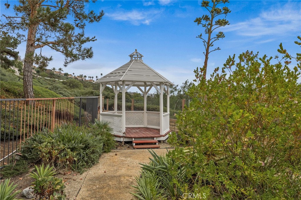 28677 La Azteca Laguna Niguel, CA 92677 - Photo 8 of 36 a front view of a house with a yard