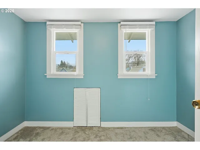 a view of a room that has a window