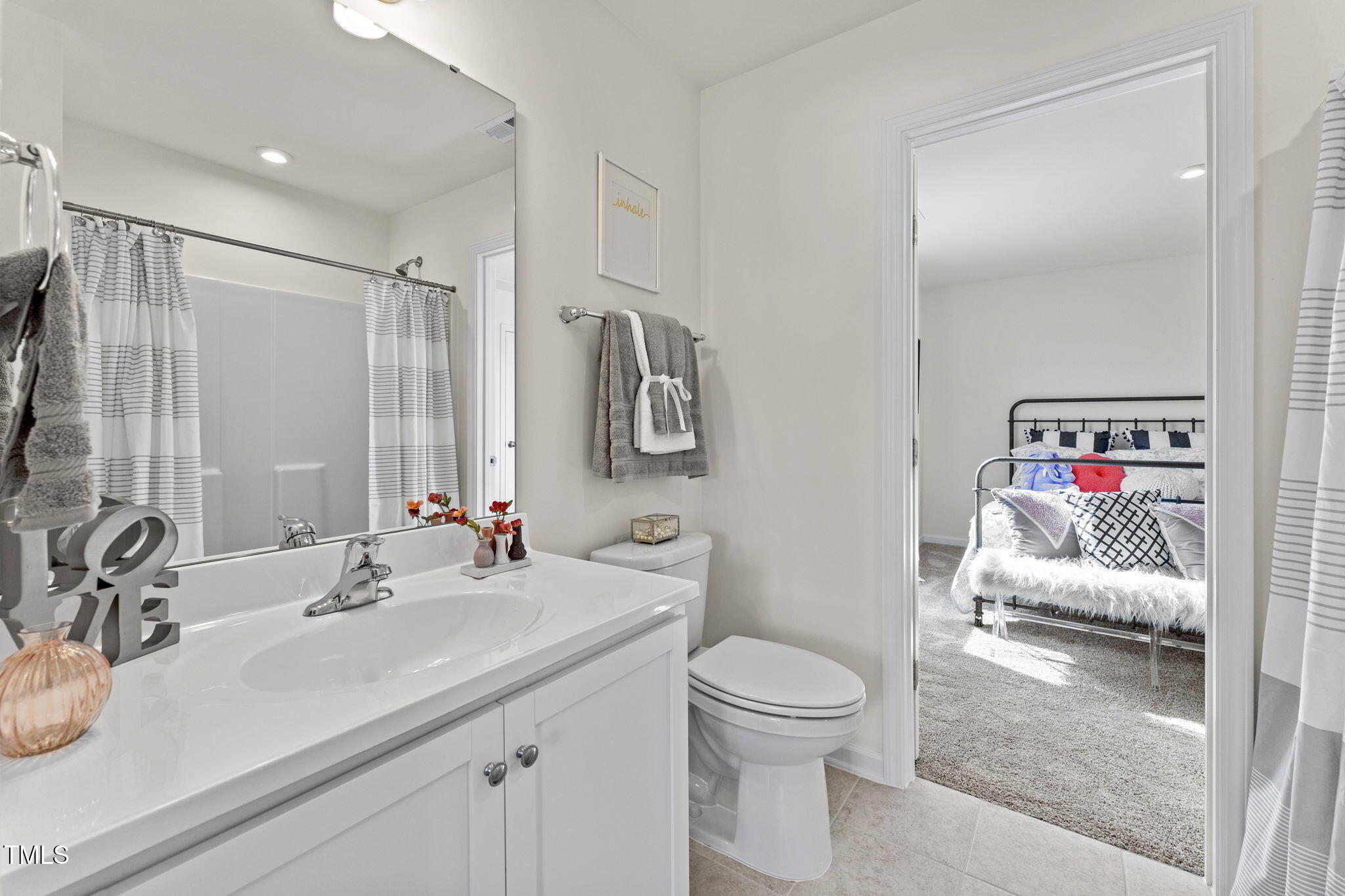 72 Cribbs Lane Middlesex, NC 27557 - Photo 27 of 45 a bathroom with a sink vanity mirror and toilet