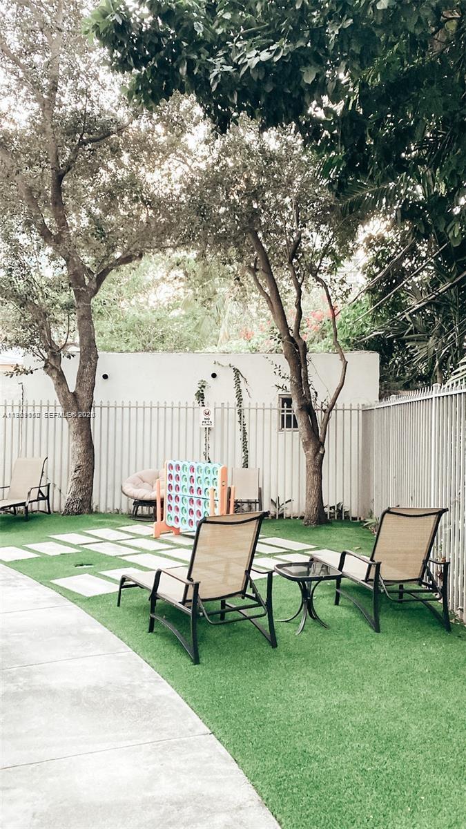 455 Northeast 25th Street, Unit 809 Miami, FL 33137 - Photo 18 of 18 a view of a bench in a park