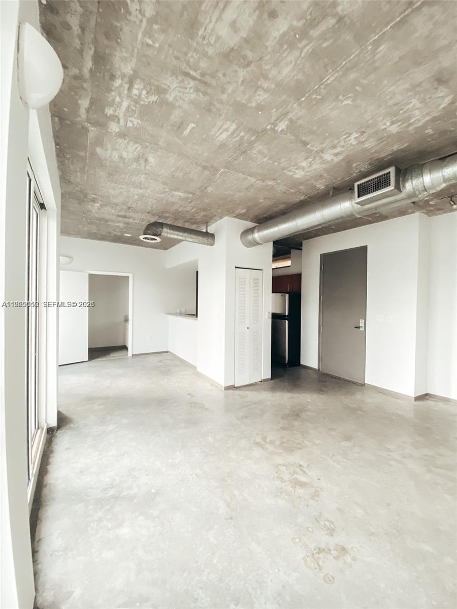 455 Northeast 25th Street, Unit 809 Miami, FL 33137 - Photo 6 of 18 wooden floor in an empty room