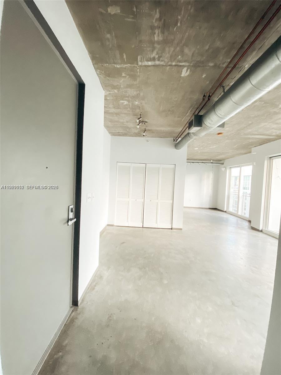 455 Northeast 25th Street, Unit 809 Miami, FL 33137 - Photo 9 of 18 a view of an empty room