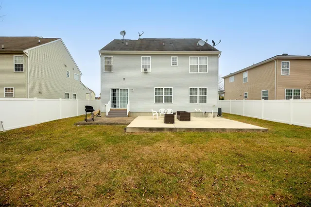a view of a house with swimming pool
