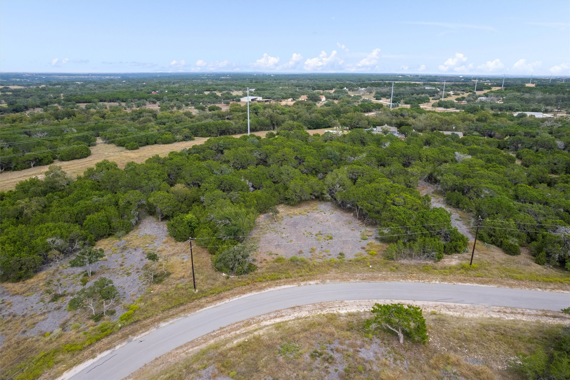 19 Riparian Elm Road Bertram, TX 78605 - Photo 5 of 10 a view of a yard with an outdoor space