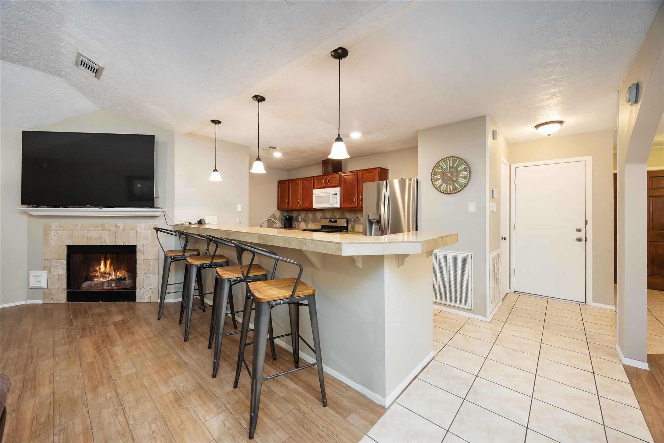 2423 Prides Crossing Road Houston, TX 77067 - Photo 13 of 27 a kitchen with a table and chairs in it