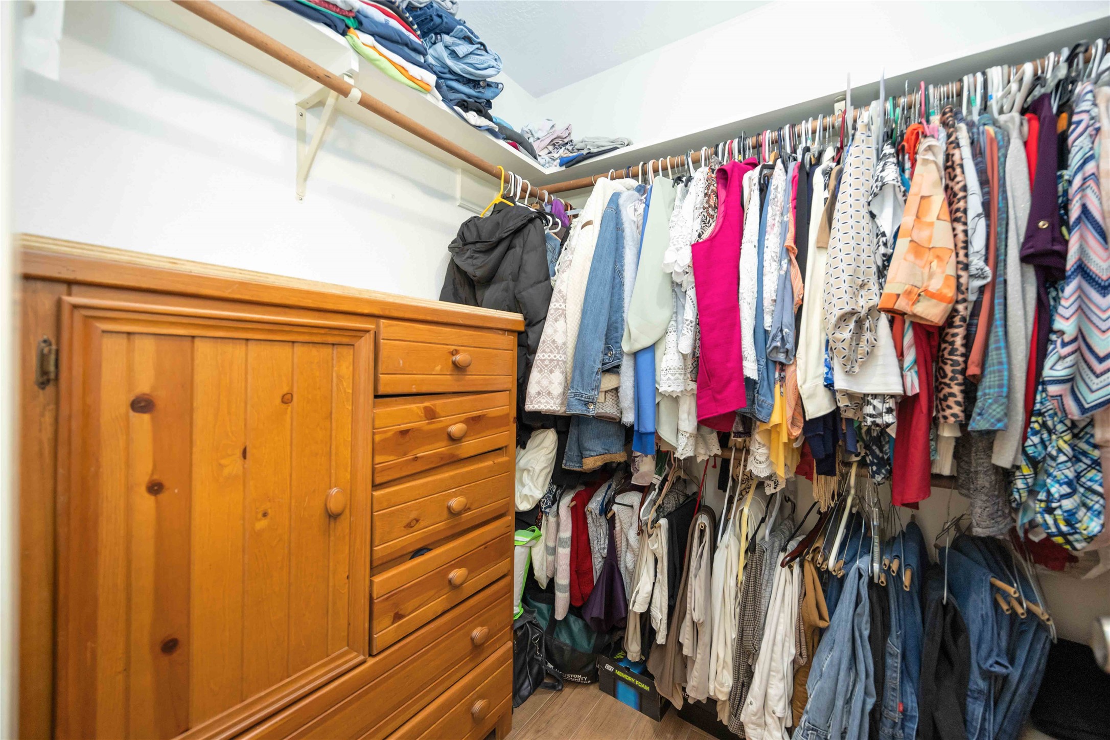 2423 Prides Crossing Road Houston, TX 77067 - Photo 19 of 27 a view of walk in closet with clothes