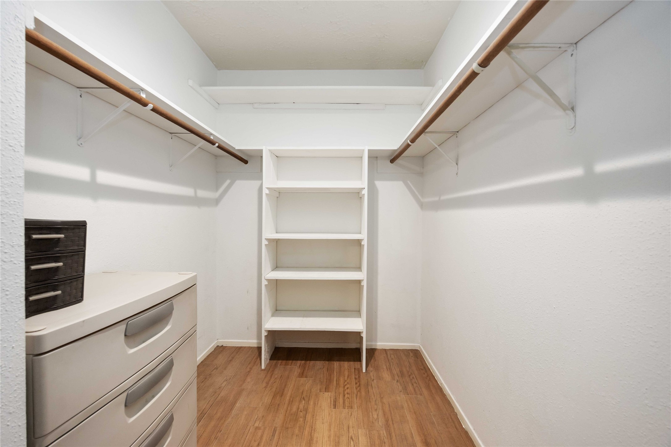 2423 Prides Crossing Road Houston, TX 77067 - Photo 24 of 27 a view of an empty walk in closet