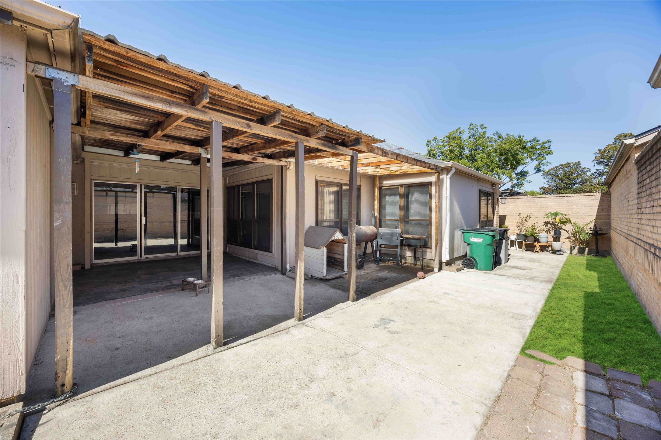 2423 Prides Crossing Road Houston, TX 77067 - Photo 27 of 27 a view of a house with backyard porch and sitting area