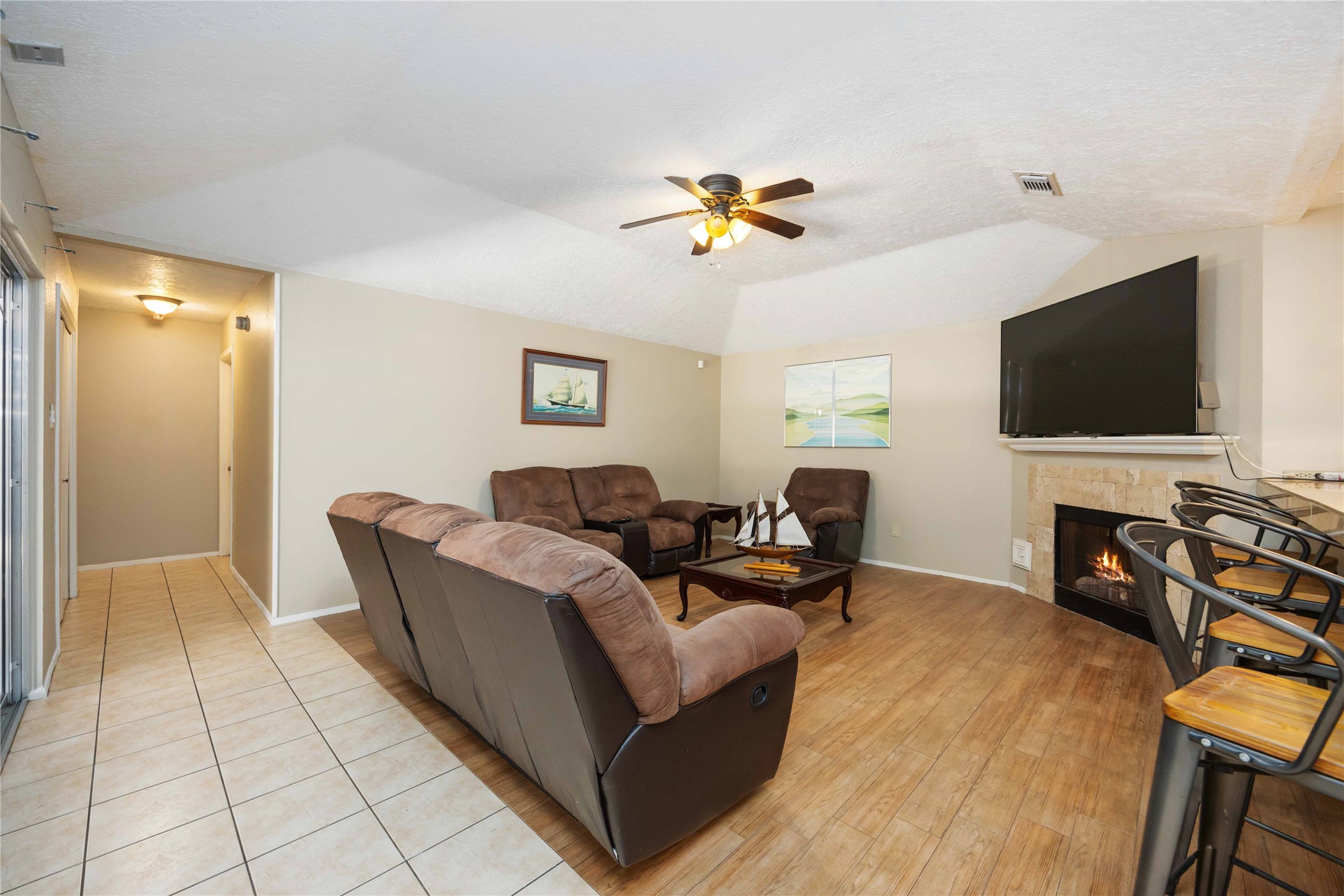 2423 Prides Crossing Road Houston, TX 77067 - Photo 7 of 27 a living room with furniture and a flat screen tv