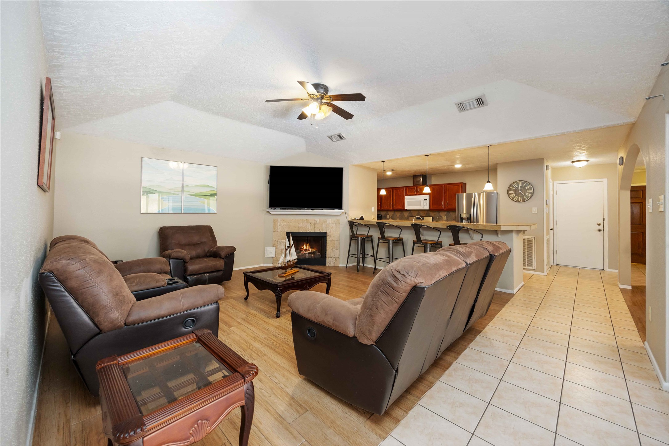 2423 Prides Crossing Road Houston, TX 77067 - Photo 8 of 27 a living room with furniture and a flat screen tv