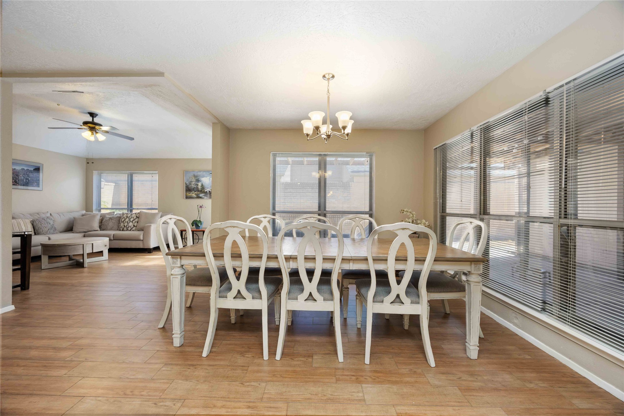 2423 Prides Crossing Road Houston, TX 77067 - Photo 10 of 27 a view of a dining room with furniture window and wooden floor