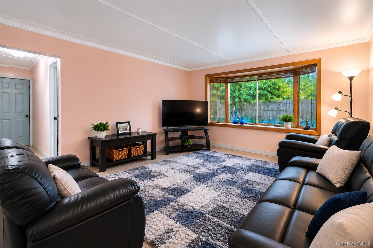 1 Windsor Road Monroe, NY 10950 - Photo 10 of 20 a living room with furniture and a flat screen tv