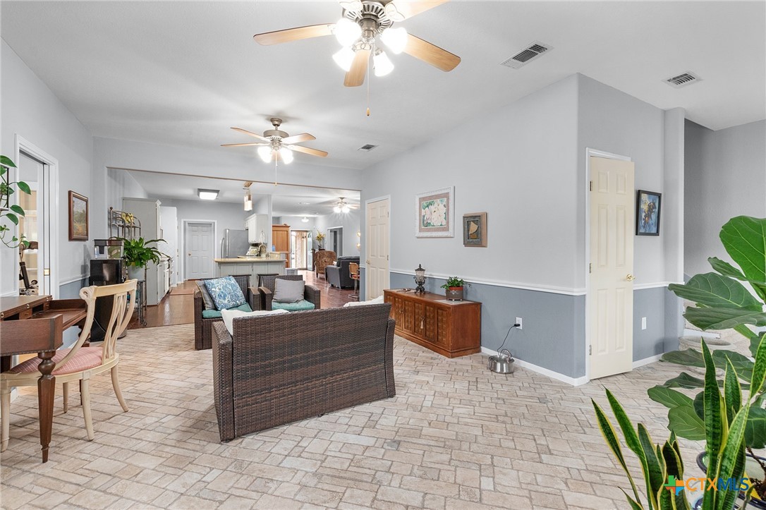 812 Taylor Creek Road Copperas Cove, TX 76522 - Photo 17 of 44 a living room with furniture and a dining table