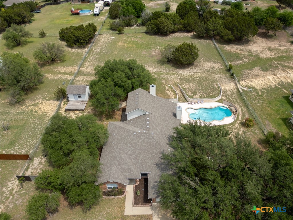 812 Taylor Creek Road Copperas Cove, TX 76522 - Photo 43 of 44 an aerial view of a house with yard and parking