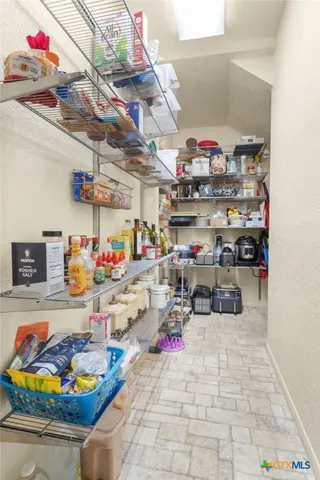 a room with lots of different kinds of food