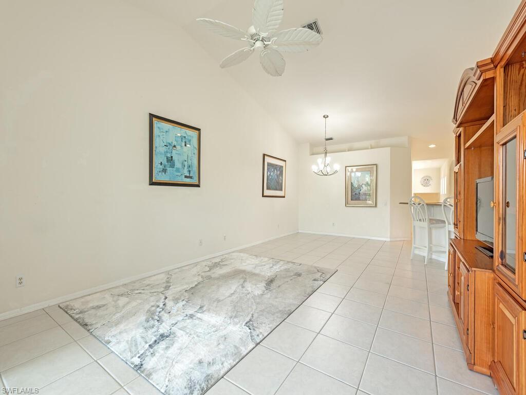 9351 Spring Run Boulevard, Unit 3203 Estero, FL 34135 - Photo 8 of 14 Great room with dining area