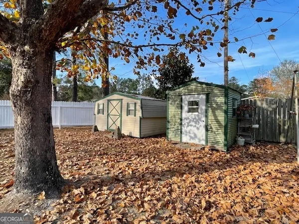 a view of a room with wooden walls