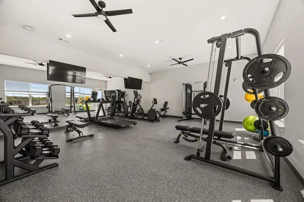 a view of a room with gym equipment