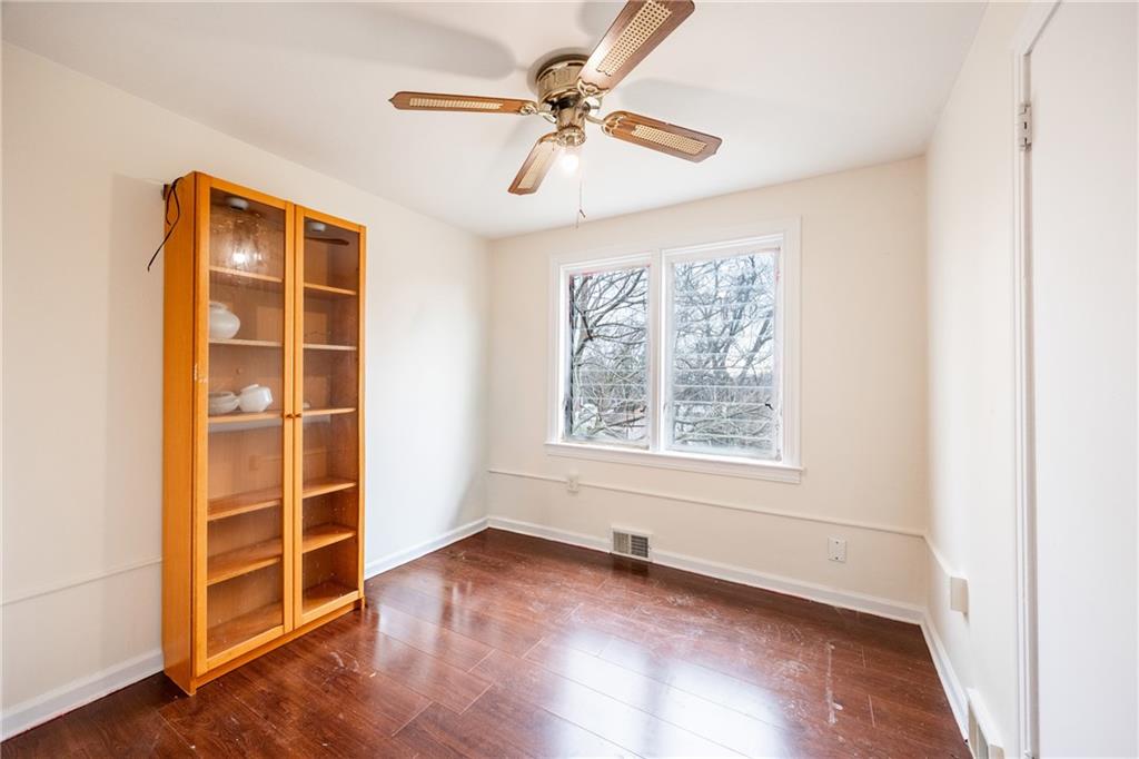 3958 Monroeville Boulevard Monroeville, PA 15146 - Photo 15 of 29 an empty room with wooden floor closet and windows