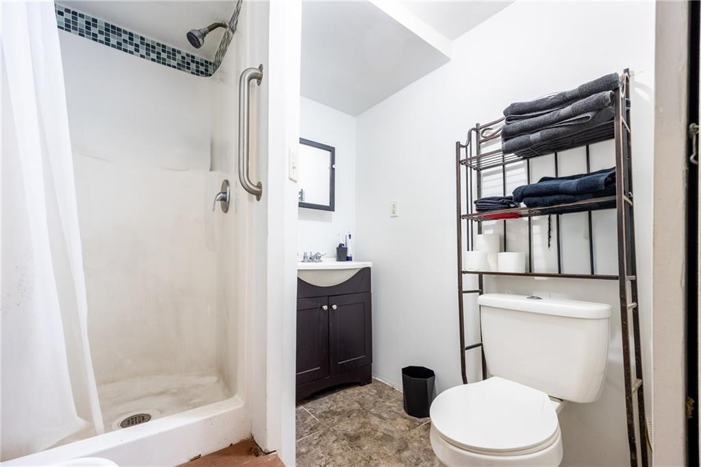 3958 Monroeville Boulevard Monroeville, PA 15146 - Photo 23 of 29 a white toilet sitting next to a bathroom sink
