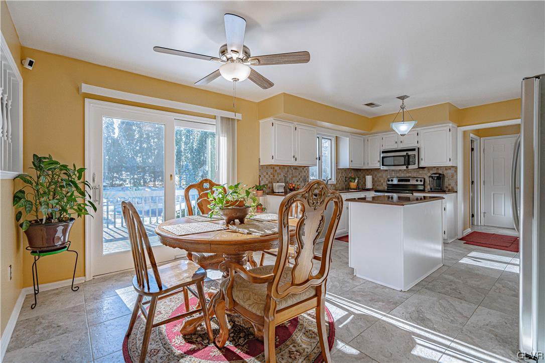 3252 Regal Road Bethlehem, PA 18020 - Photo 17 of 49 Kitchen table & sliders to deck