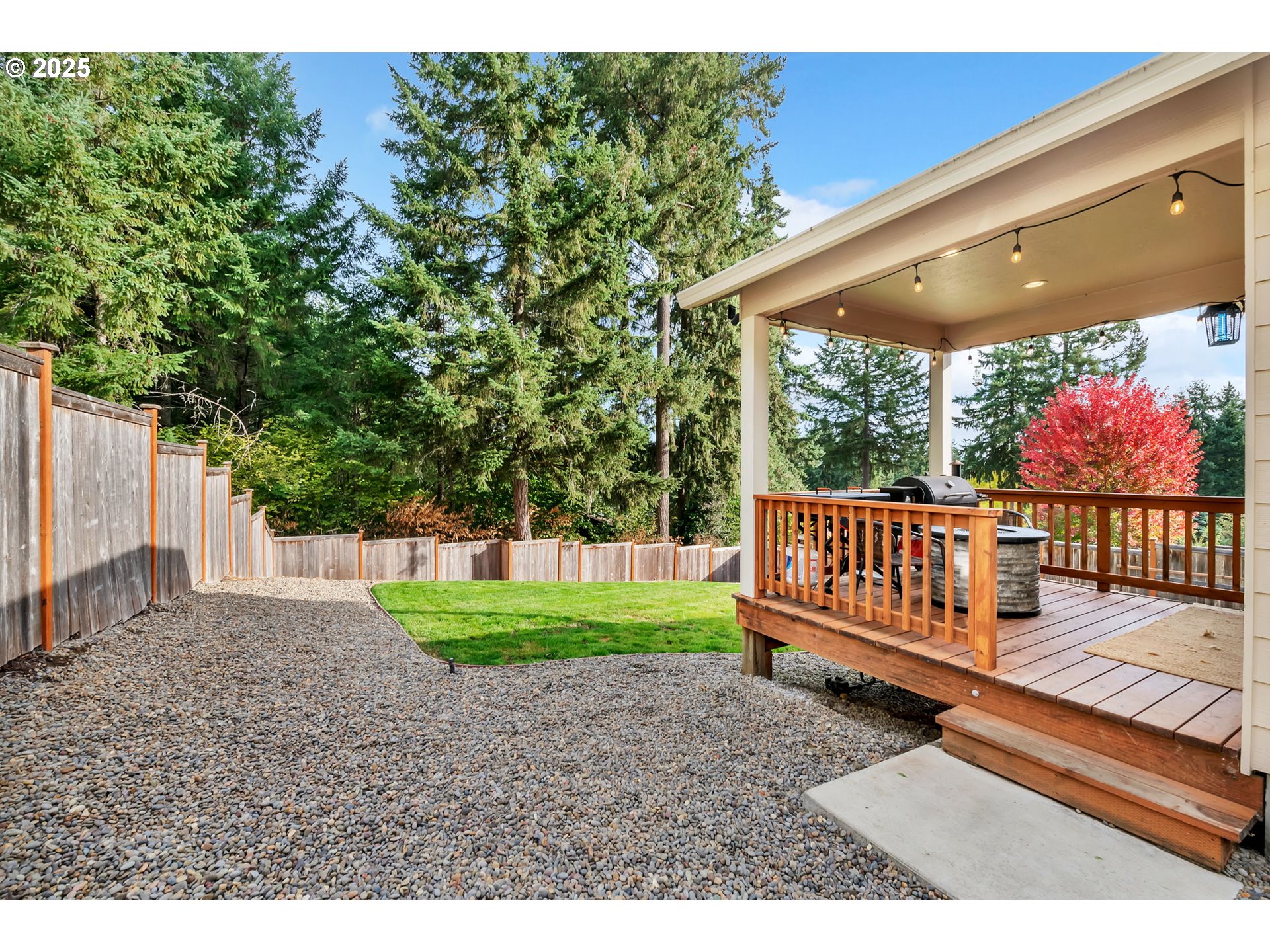 24701 Nottingham Street Veneta, OR 97487 - Photo 20 of 28 a view of a porch with a bench