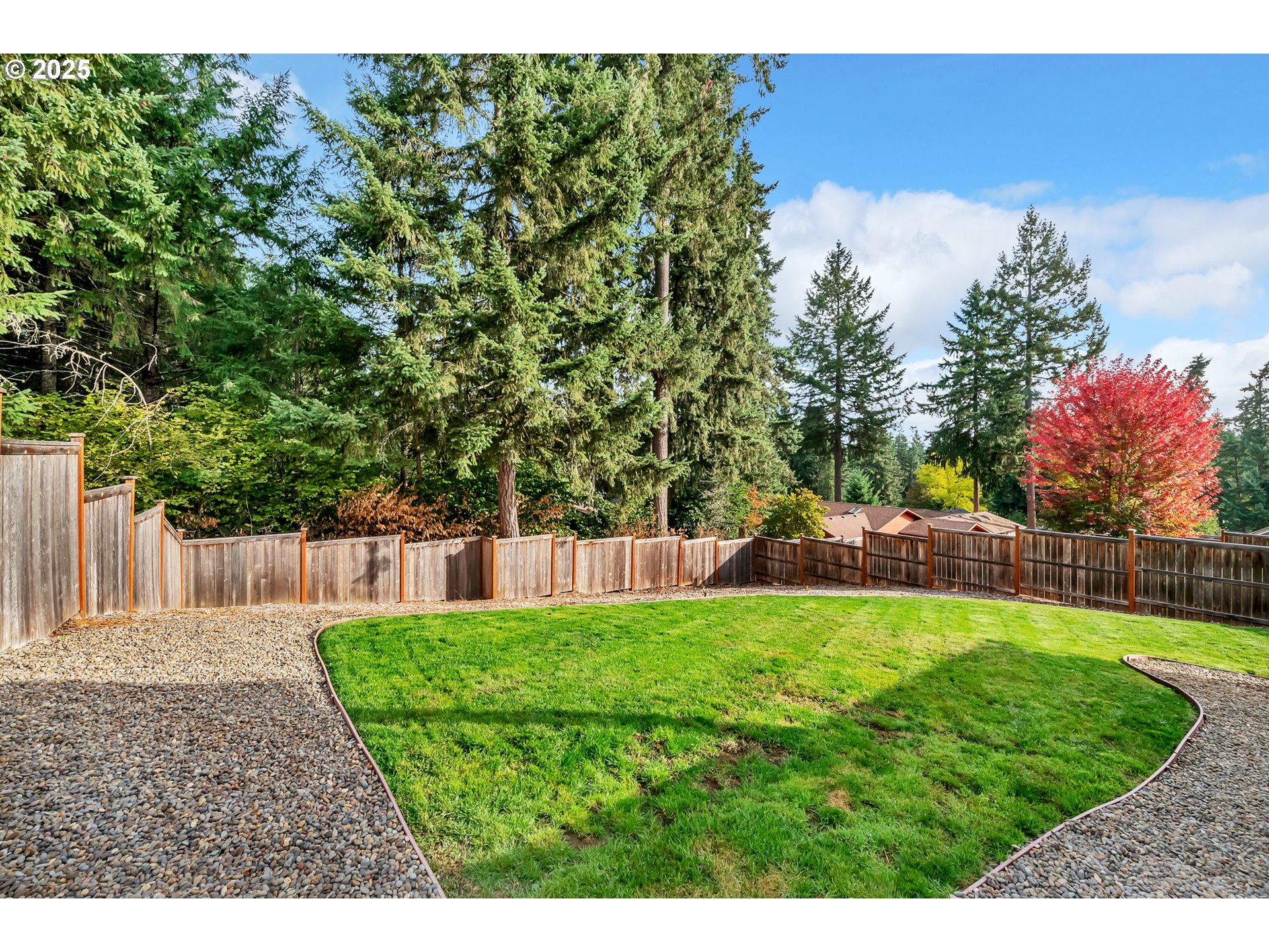 24701 Nottingham Street Veneta, OR 97487 - Photo 21 of 28 a view of a backyard with a garden