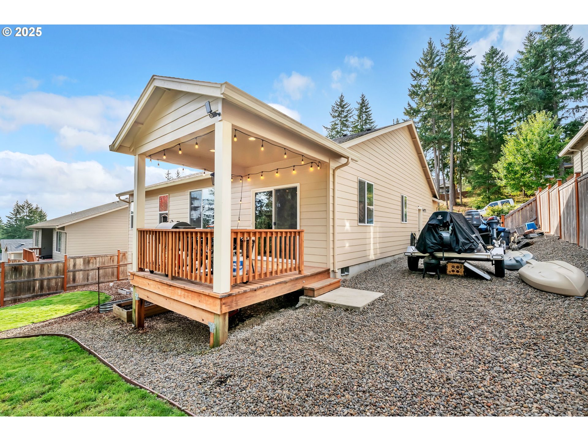 24701 Nottingham Street Veneta, OR 97487 - Photo 24 of 28 a view of a house with a yard and deck