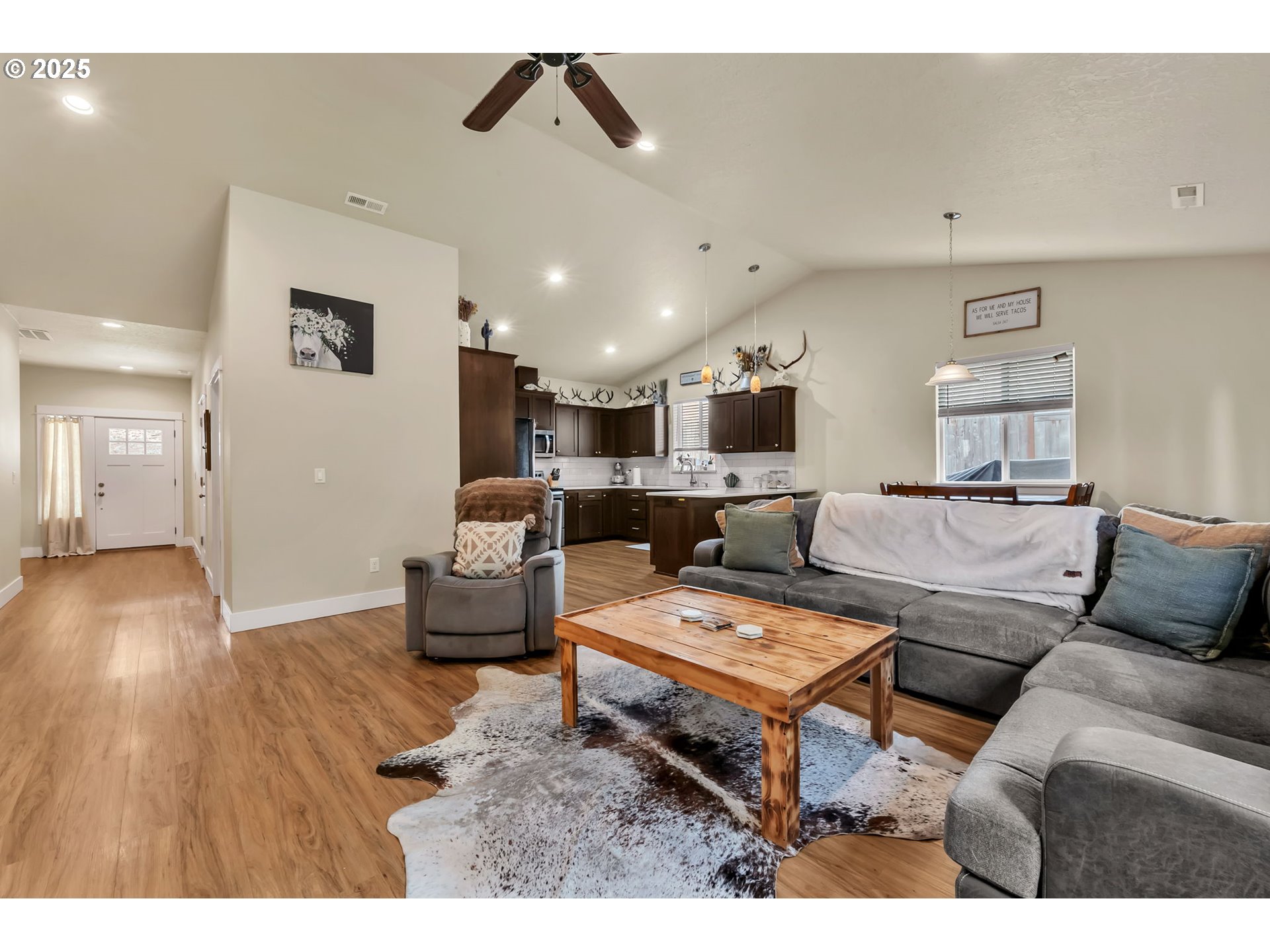 24701 Nottingham Street Veneta, OR 97487 - Photo 4 of 28 a living room with furniture and wooden floor