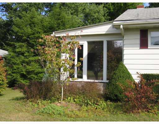 1127 Evans City Road Renfrew, PA 16053 - Photo 9 of 16 Exterior Front. Sunroom