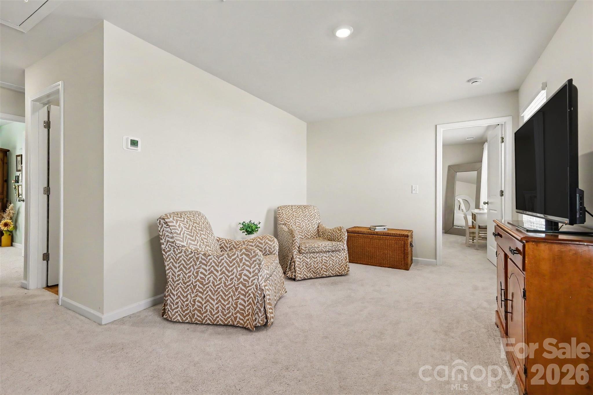 633 Mile Crk Road Edgemoor, SC 29712 - Photo 12 of 26 a living room with furniture and a flat screen tv
