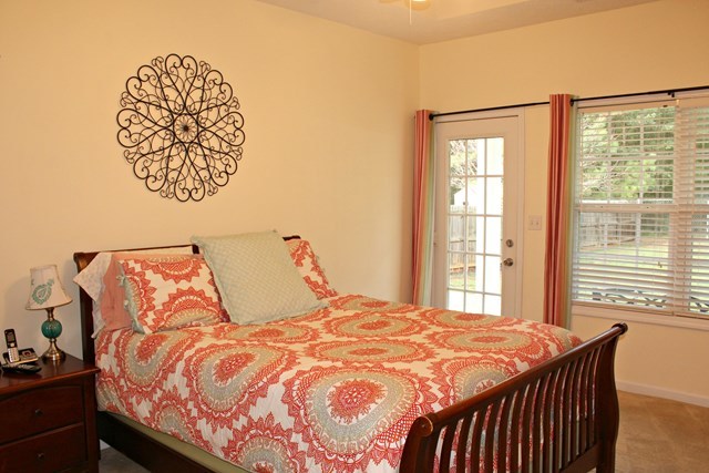 313 Hickory Road Jackson, GA 30233 - Photo 9 of 17 a bedroom with a bed and a window