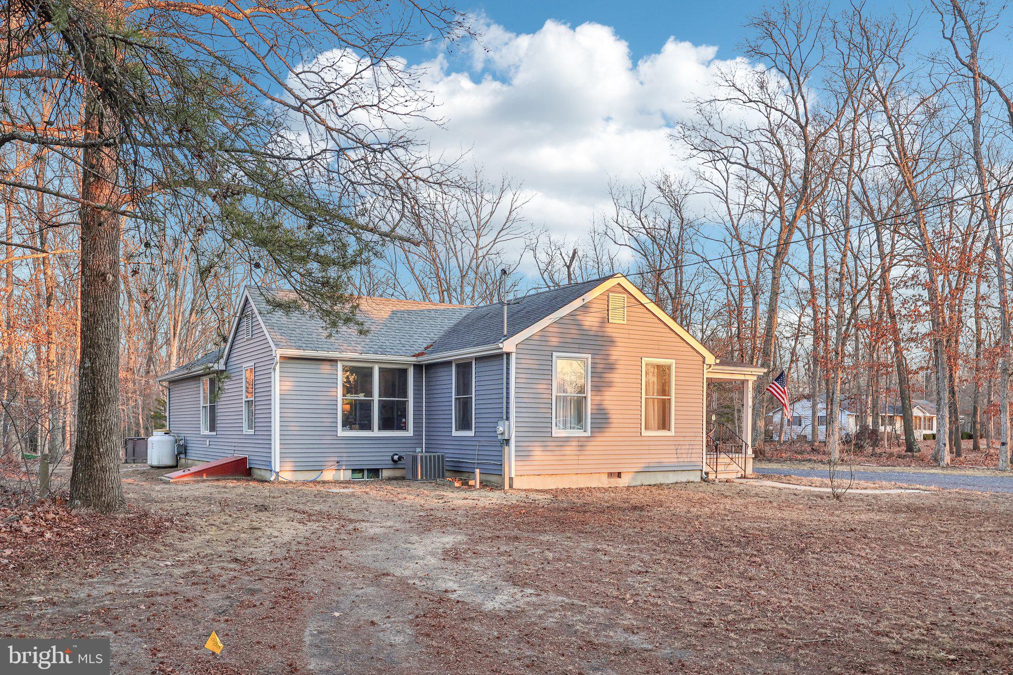 1476 Jesse Bridge Road Elmer, NJ 08318 - Photo 3 of 45 a view of a yard in front of a house