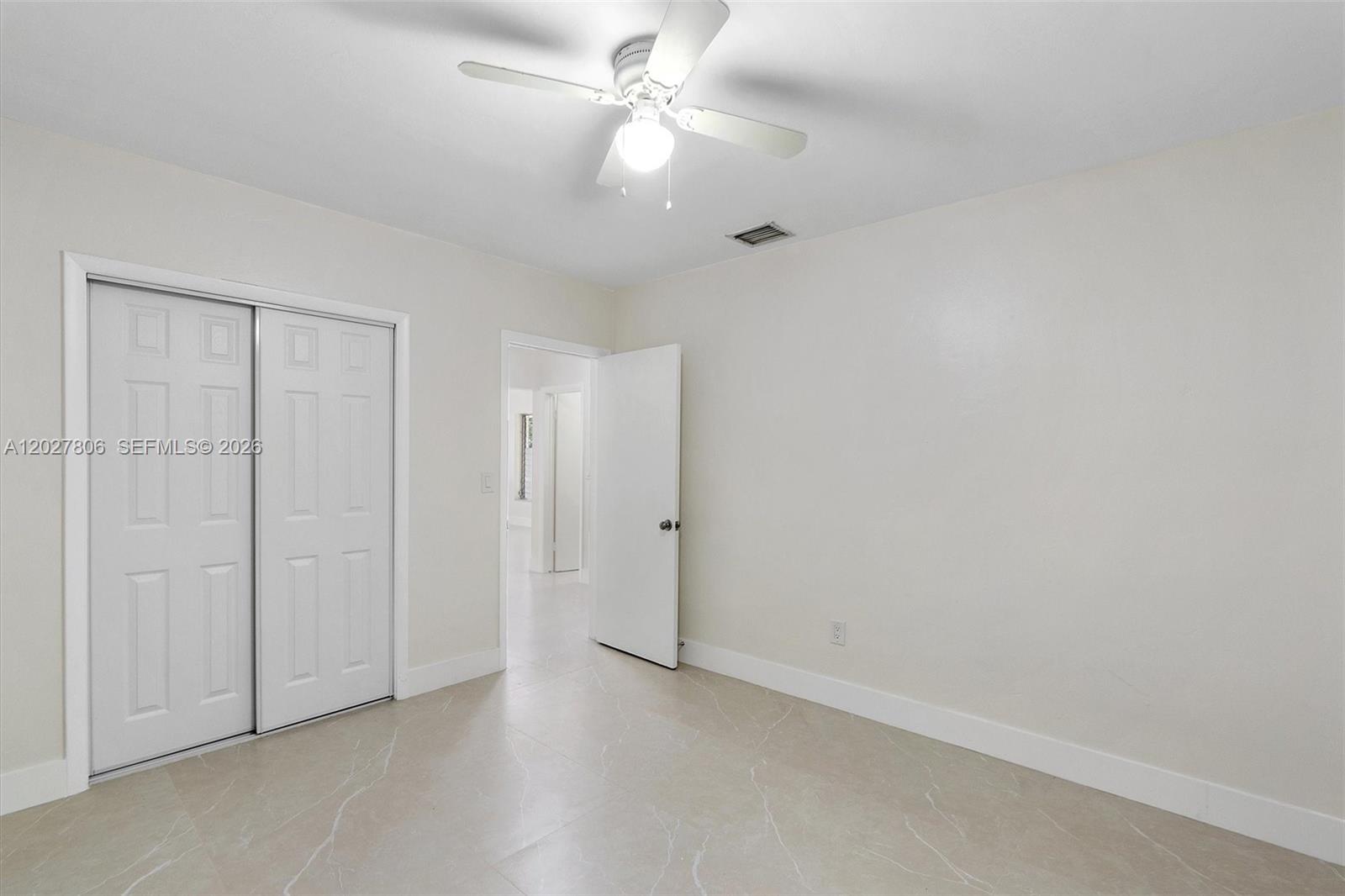 1612 Southwest 23rd Street, Unit 1612 Miami, FL 33145 - Photo 37 of 42 wooden floor in an empty room