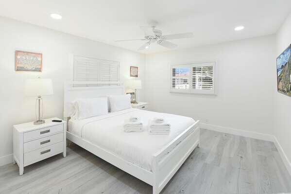 839 Enfield Street Boca Raton, FL 33487 - Photo 15 of 36 a large white bed in a white room