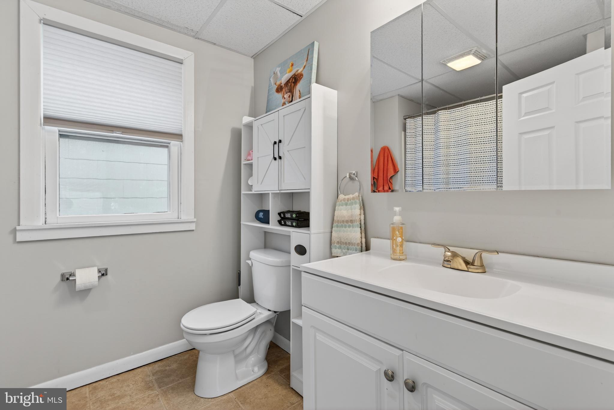 222 North Franklin Street Hanover, PA 17331 - Photo 22 of 29 a bathroom with a toilet sink and mirror