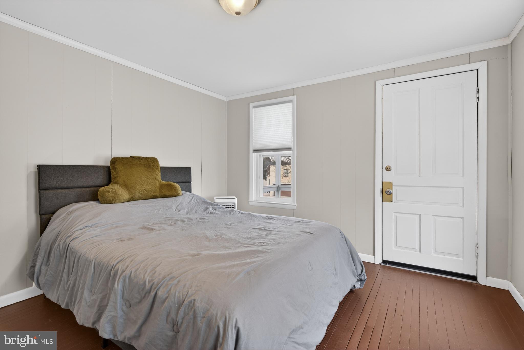 222 North Franklin Street Hanover, PA 17331 - Photo 23 of 29 a bedroom with a bed and wooden floor