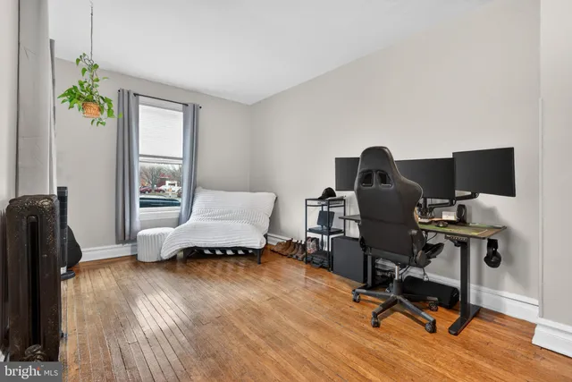 a workspace with furniture and a window