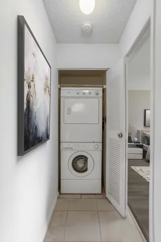 a view of a storage & utility room with washer and dryer