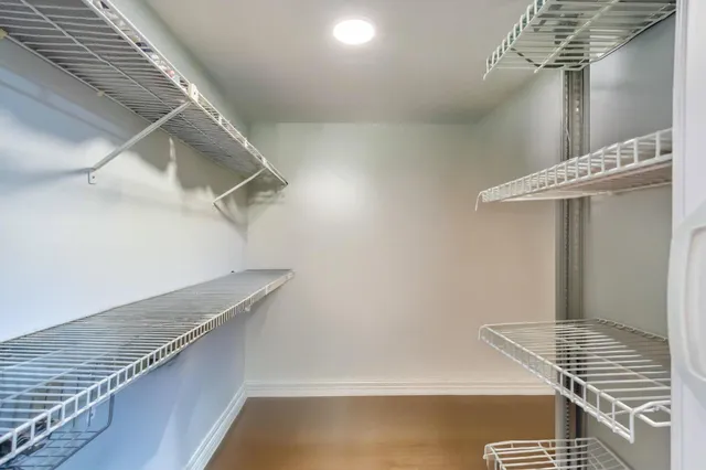 a view of entryway and kitchen