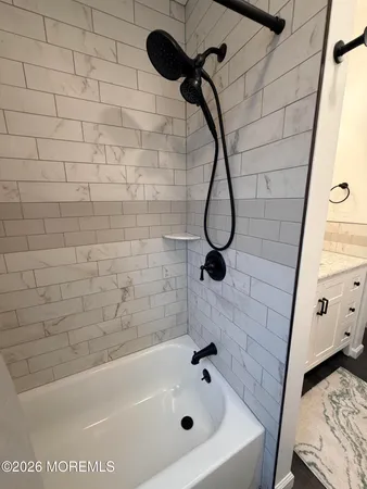 a bathroom with a bathtub