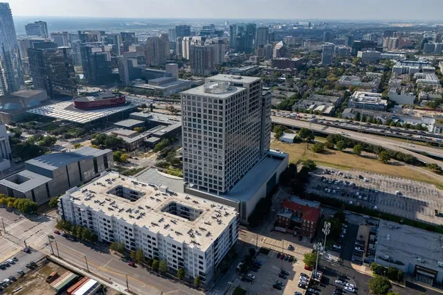 a view of a city with tall buildings