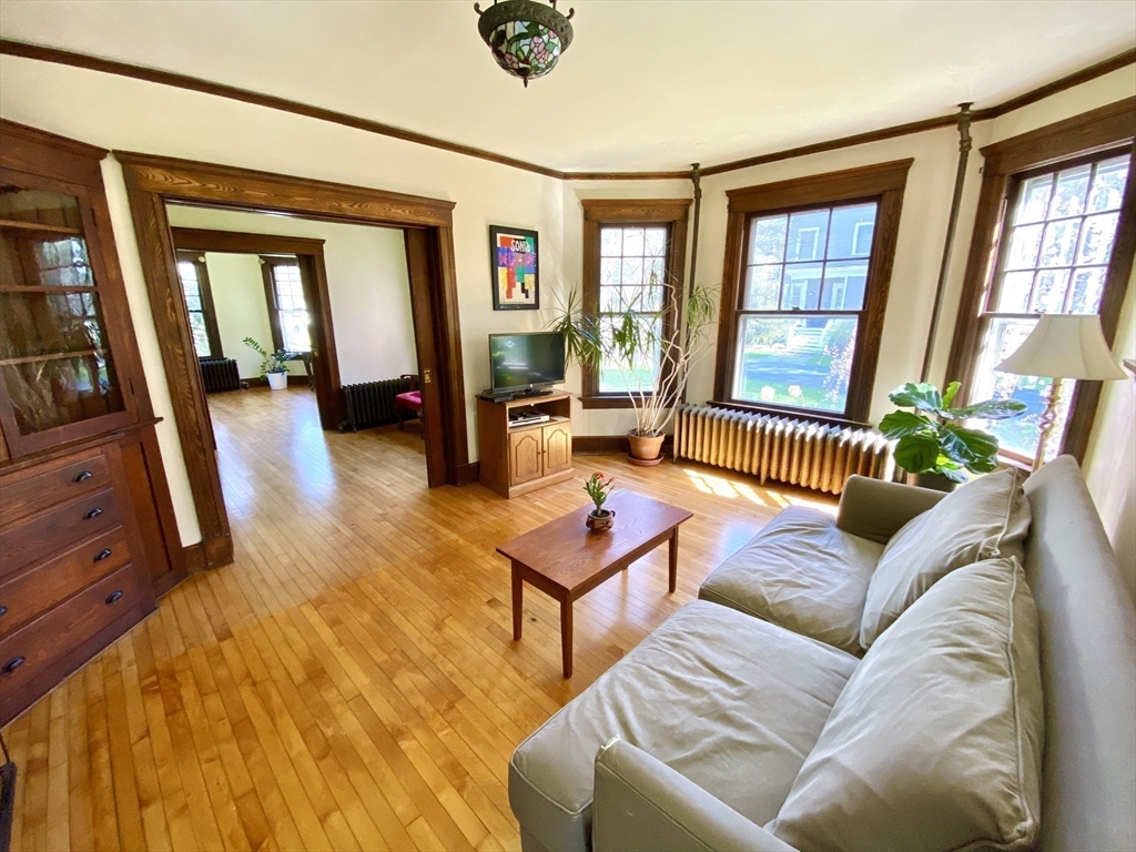 14 Nutting Avenue Amherst, MA 01002 - Photo 12 of 41 a living room with furniture and a window