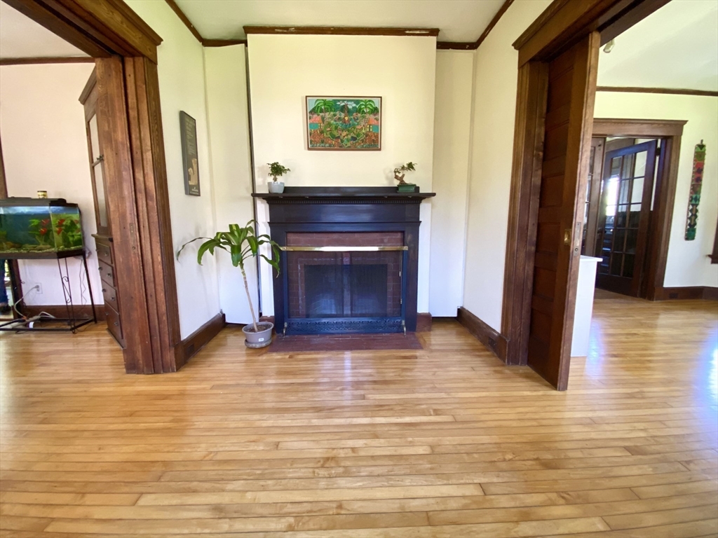 14 Nutting Avenue Amherst, MA 01002 - Photo 14 of 41 a view of a living room with furniture and a fireplace